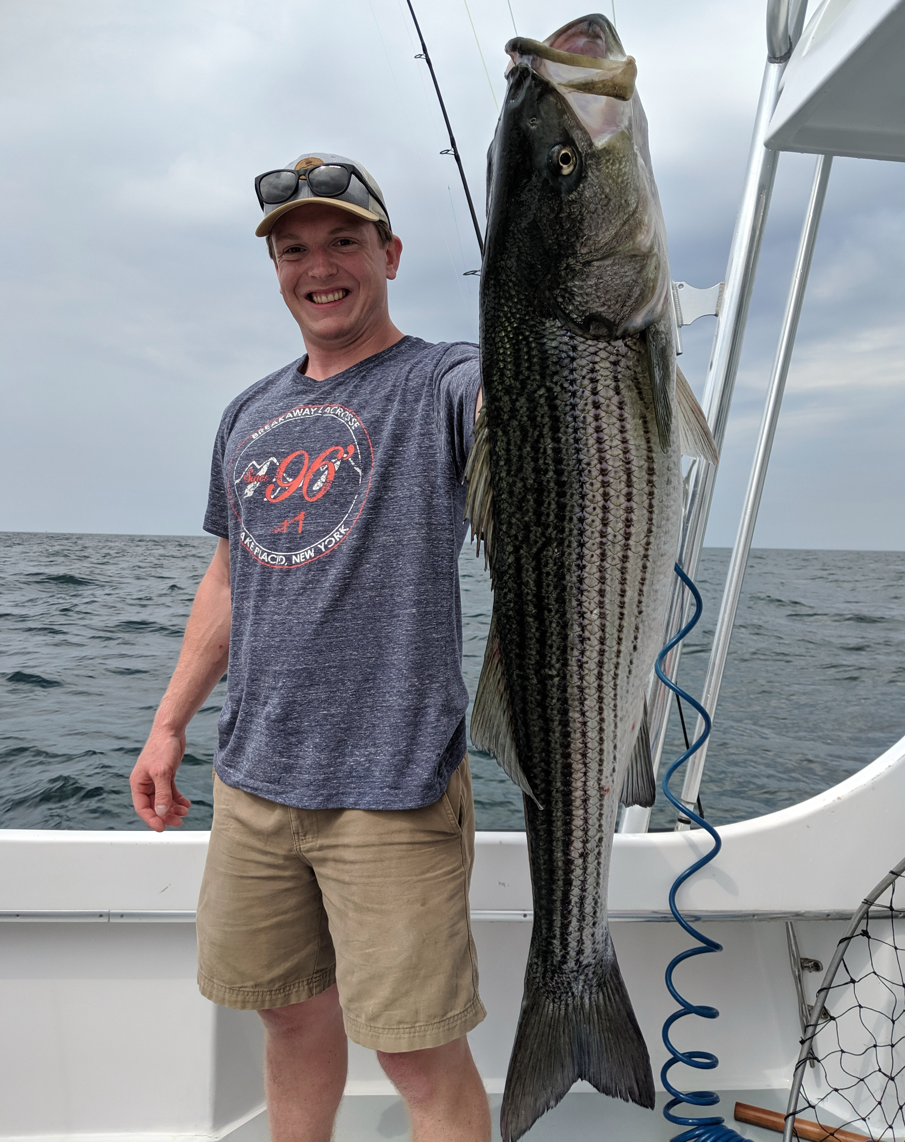 a proud boy with his bass